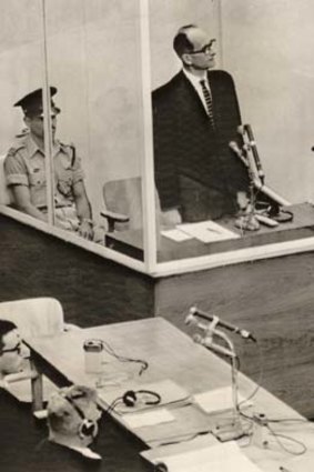 Top-ranking Nazi ... Adolf Eichmann faces trial in Jerusalem in 1961.