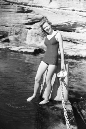 A swimmer tests the water at Coogee in 1947.