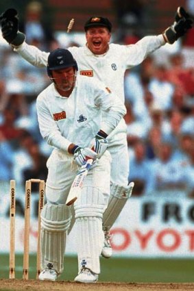 Oooh, that's a good one! England's Mike Gatting is bowled by Shane Warne in Manchester.