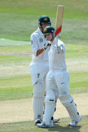 Ton up: Steve Smith  celebrates with Ashton Agar after reaching his century during the tour match against Sussex.