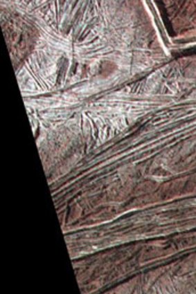 Cracks and ridges on the surface of Europa.