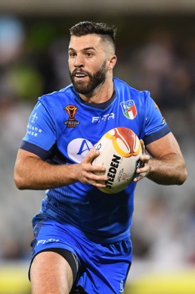 James Tedesco of Italy looks for options.