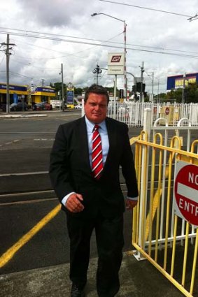 Labor's Lord Mayoral candidate Ray Smith at Coorparoo rail crossing.