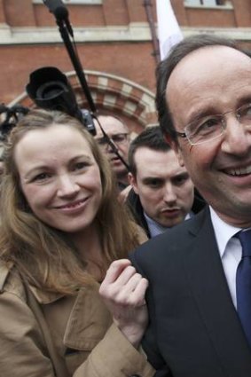 Axelle Lemaire (left) and President Francois Holande.