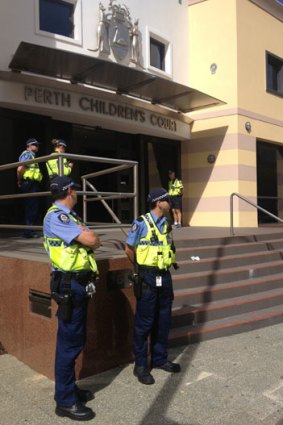 There was a strong police presence outside the court.