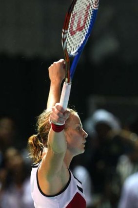 Back on top ... Jelena Dokic celebrates her triumph.
