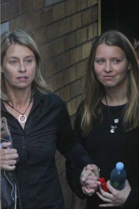 Very level-headed ... Belinda and Madeleine Pulver leaving their home yesterday.