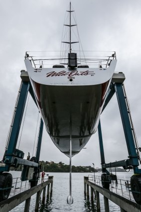 Wild Oats XI is lifted from the water at Woolwich Dock for the final check before the  Sydney to Hobart Yacht Race. 