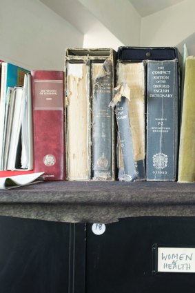 Books lined up inside Germaine Greer's Essex office.