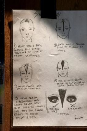 Transformation: Make-up instructions in a backstage dressing area for Matthew Bourne's <i>Swan Lake</i>.