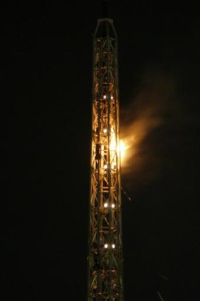 The arts centre spire aflame.