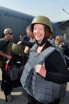 A decade at war: Former prime minister Julia Gillard visited Afghanistan last year.