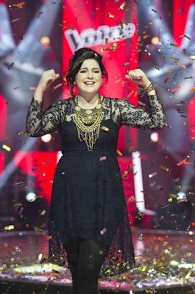 <i>The Voice</i> winner Karise Eden celebrates her victory in 2012.