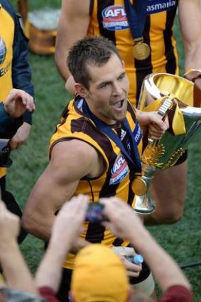 Luke Hodge with the premiership cup.