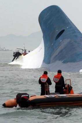 The ferry Sewol slips below the water off the island of Byungpoong.