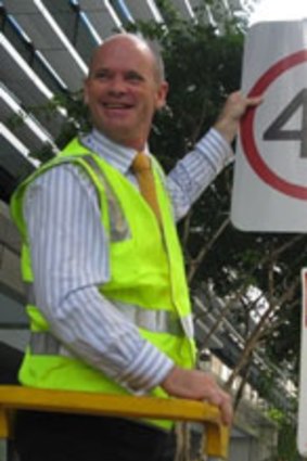 Lord Mayor Campbell Newman unveils the 40kmh speed signs.