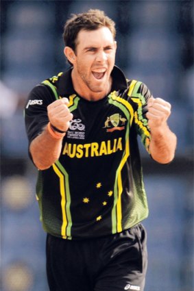 Glenn Maxwell celebrates taking a wicket in a World Twenty20 match.