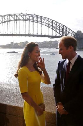 Prince William and the Duchess of Cambridge in front of the Sydney Harbour Bridge.
