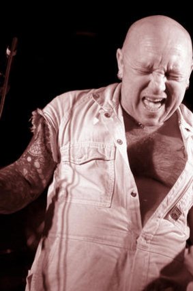Angry Anderson performing with Rose Tattoo.