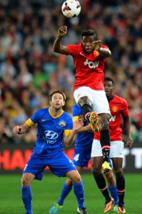 Flying high: Wilfried Zaha heads the ball against the All-Stars.