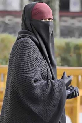 A woman wears the niqab in Lyon, France.