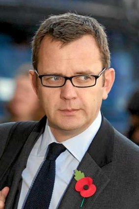 Former <i>News of the World</i> editor and Downing Street communications chief Andy Coulson arrives for the first day of the phone-hacking trial.