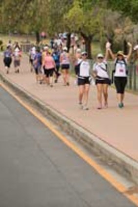 Walkers cheering each other on, as part of the Weekend to End Women's Cancer
