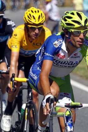 On the attack ... Vincenzo Nibali, right, cycles ahead of Bradley Wiggins during  the 15th stage of the Tour de France.