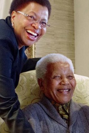 Mandela and his wife Graca Machel at their home in August 2012.