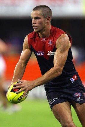 Shaping up: Daniel Nicholson drives Melbourne into attack.