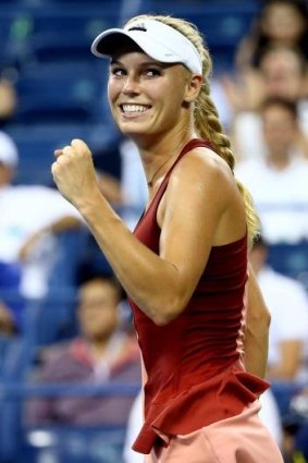 Caroline Wozniacki celebrates her win over Sara Errani.