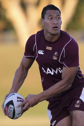 Training day ... Israel Folau with the Maroons yesterday.