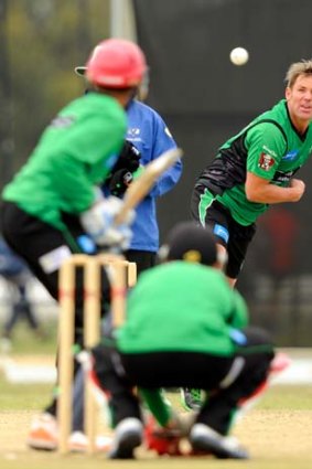 Still got it ... Shane Warne lets one rip during practice for the Melbourne Stars this week.