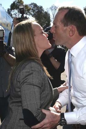 Opposition Leader Tony Abbott greets Liberals candidate Fiona Scott.