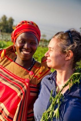 Judith Lucy with Irene Cheptoek, the leader of women's farming collective that ActionAid supported women to establish in Kapchorwa in eastern Uganda. 