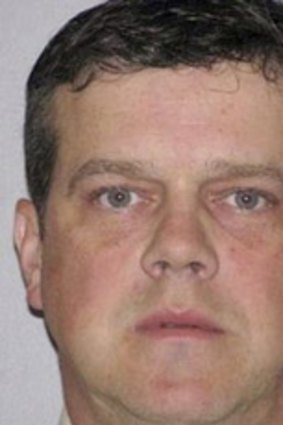 Philip James Conran, who police say targeted his neighbour in an online posting that invited strangers to a rowdy orgy with a soccer mum. (AP Photo/West Hartford Police)