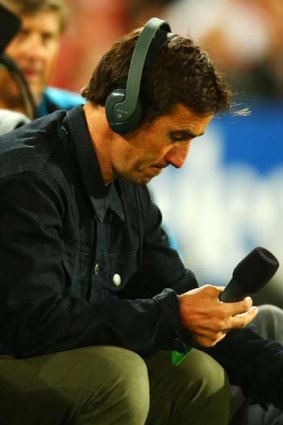 Andrew Johns commentates from the sideline for Triple M radio during the round eight NRL match between St George Illawarra and the Manly Sea Eagles on Monday.