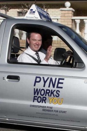 Christopher Pyne takes off in his ute.