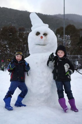 Building a snowman is a rite of passage.