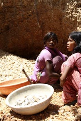 Renu and Khushbu, 12 and 10, also work in an illegal mica mine.