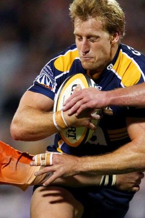 On the outer . . . Patrick Phibbs of the Brumbies.
