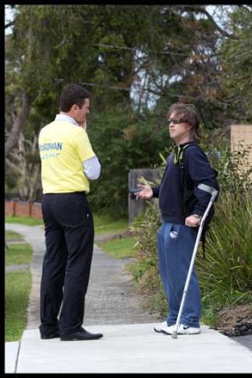 Nick McGowan speaks with local resident Cameron Smith.