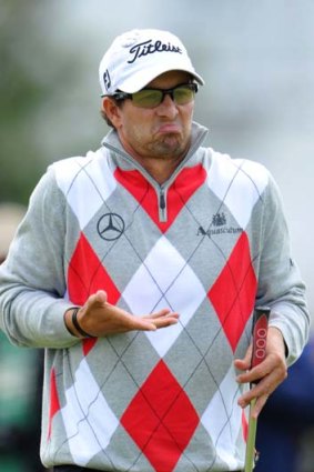 Nothing to it: Adam Scott during his opening-round 64 at the British Open.