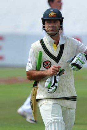 Ricky Ponting walks back to the pavillion after been dissmissed for eight runs during the first day of the first Test.