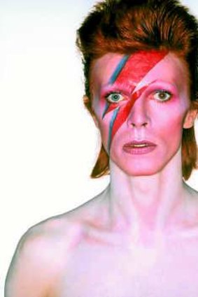 David Bowie poses during the <I>Aladdin Sane</i> album cover photo shoot.