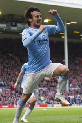 Drew level: Manchester City's David Silva celebrates his goal against Liverpool.