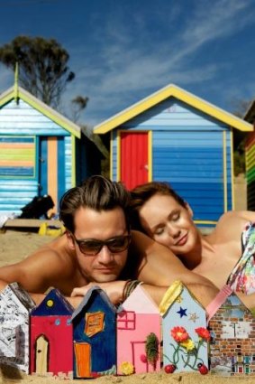 Microcosm of Melbourne: Models Kaye and Ben from Chadwick models soak up the notion of home at Brighton Beach.