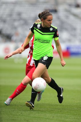 Nicole Begg of Canberra controls the ball.