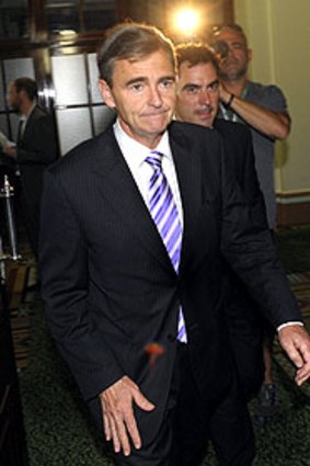 Former premier John Brumby leaves a caucus meeting yesterday.