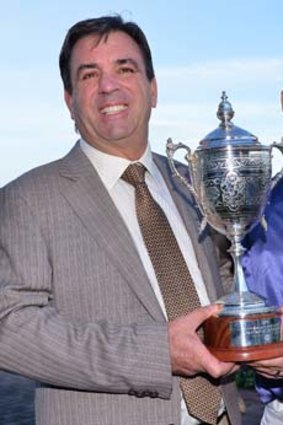 Trainer Mark Kavanagh and Michael Rodd with the trophy after Atlantic Jewel won the Memsie Stakes.